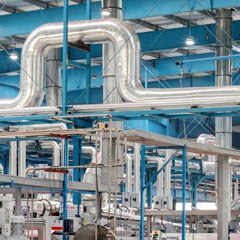 Photo: Industrial equipment in a factory. Photo by Lalit Kumar.